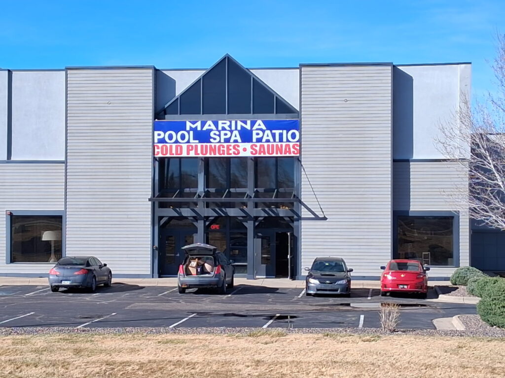 Marina Pool, Spa & Patio's new location at 10777 West 6th Avenue in Lakewood, CO. It features a 21,000 square foot showroom with numerous products from hot tubs to cold plunges, patio furniture to outdoor kitchens, and a huge selection of pool chemicals and accessories.